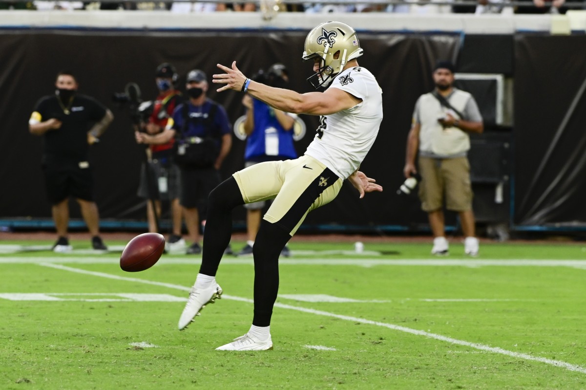 New Orleans Saints punter Blake Gillikin (4) punts during against the Green Bay Packers. Mandatory Credit: Tommy Gilligan-USA TODAY Sports